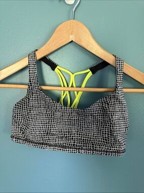 Lululemon Sports Bra size small black & white with Neon Yellow Strappy Back